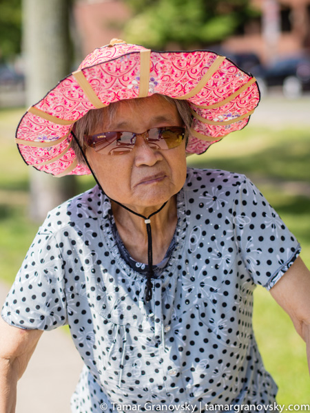 Woman Taking Advantage of a Lovely Summer Day - Walking Along the Esplanade, Cambridge, MA, U.S